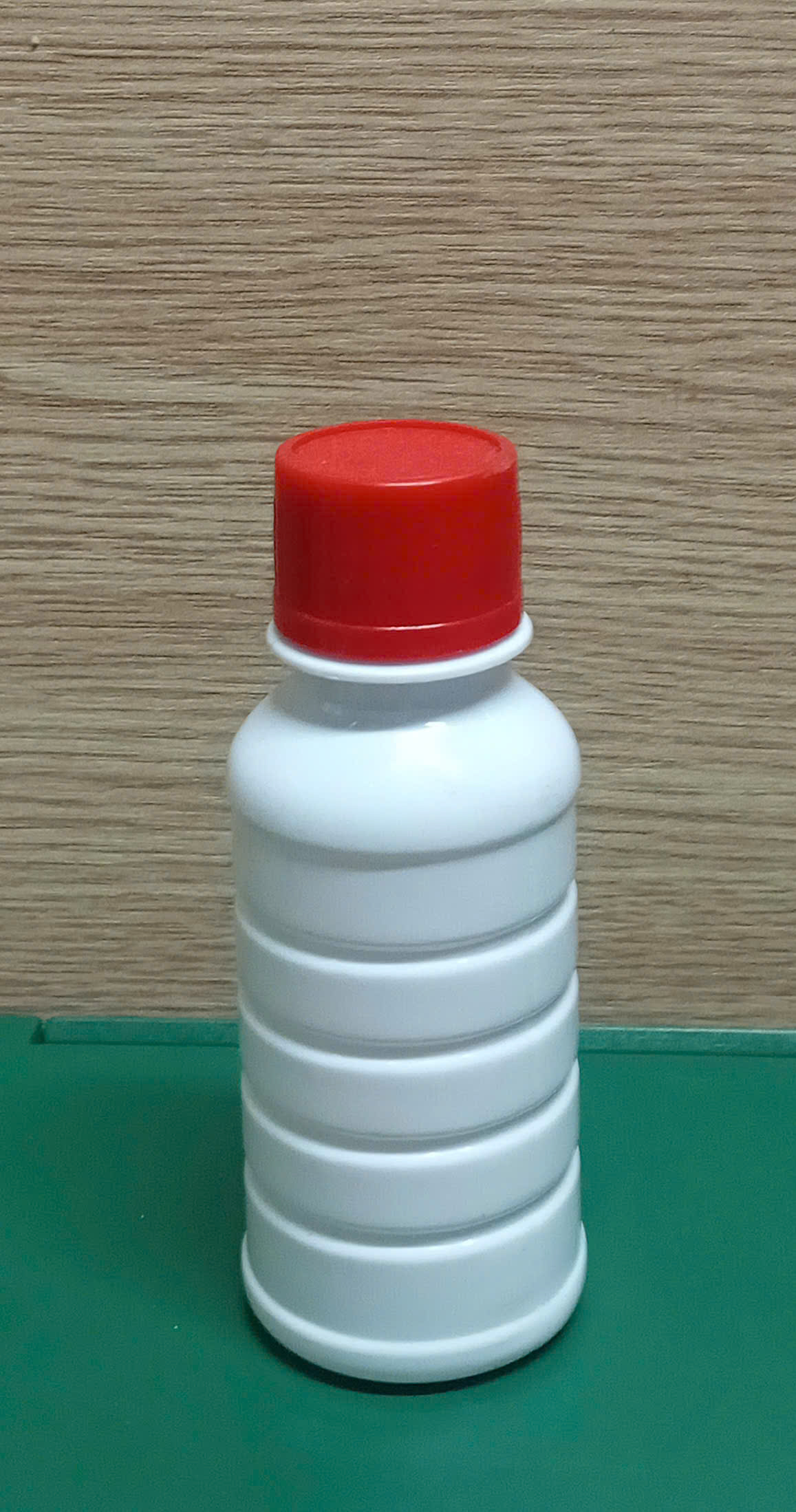 Chai nhựa PET 100 ml Tròn vân (Trắng đục)